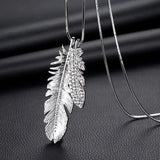 Long geometric chain necklace for women featuring a pendant, stylish maxi jewelry accessory in a modern fashion design.