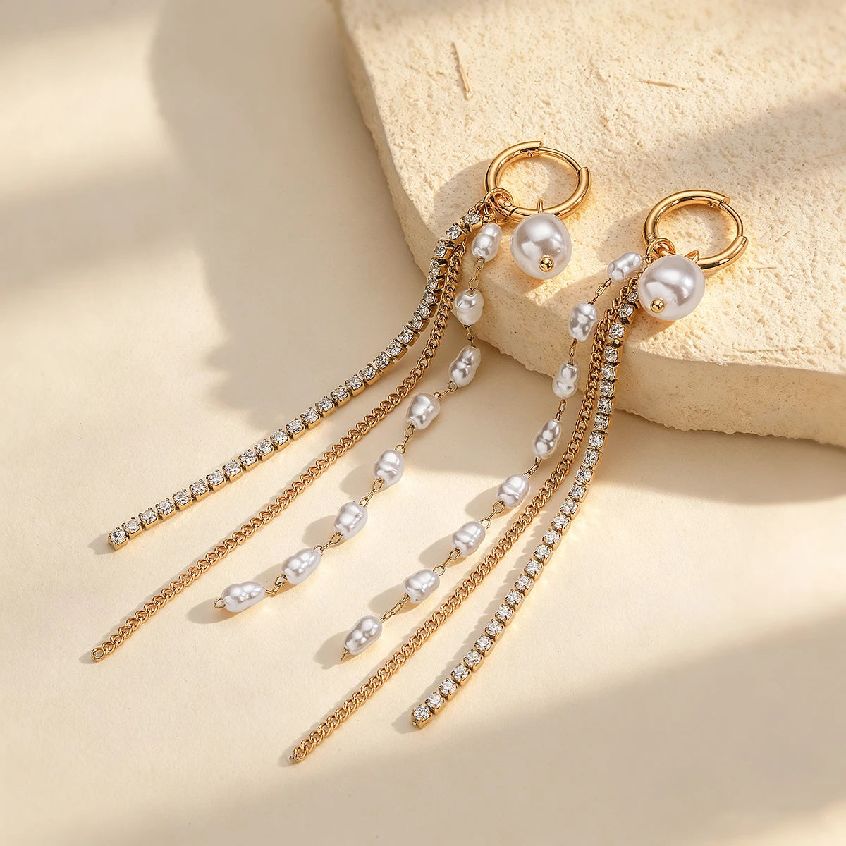 Gold color long tassel dangle earrings for women by HSF Marketplace, featuring layered hanging strands