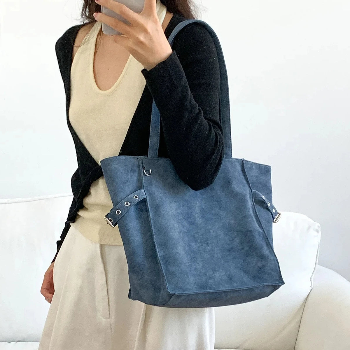 Black Rivet Design women's shoulder handbag with large capacity, elegant tote style, suitable for office, by HSF Marketplace.