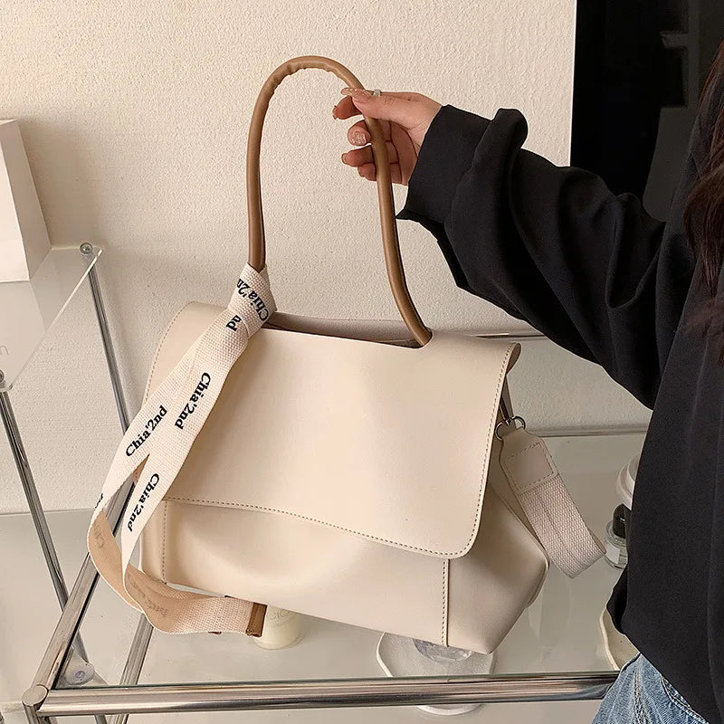Large capacity women's tote bag by HSF Marketplace, high-quality PU leather shoulder handbag with luxury design and stylish details.