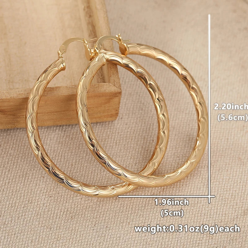 Classic metal hoop earrings with carved pattern for women by HSF Marketplace