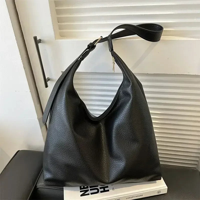 Fashion leather tote bag for women, large high-capacity shoulder handbag with simple design, perfect for everyday use.