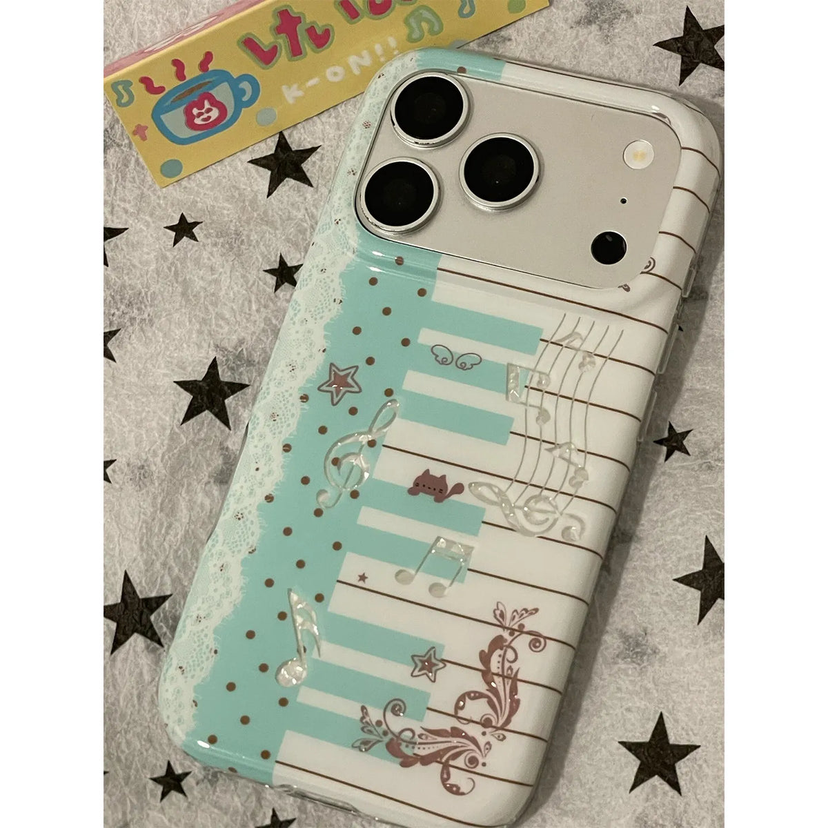 Mint green kitten piano keys phone case for iPhone models by HSF Marketplace