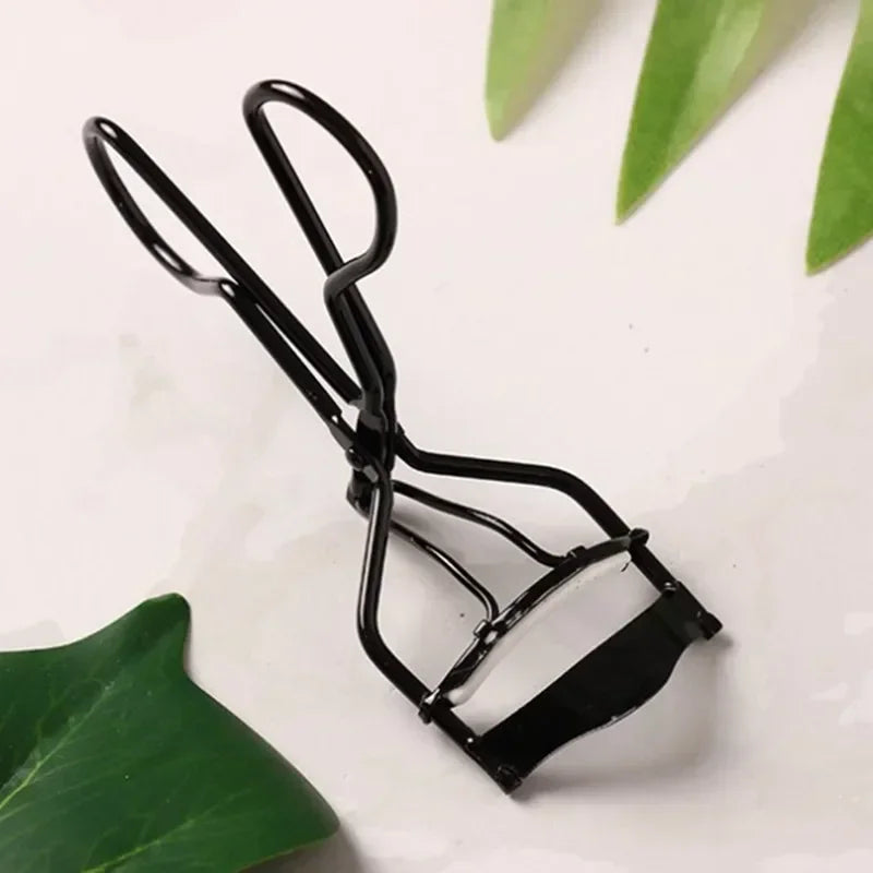 Multicolor woman eyelash curler from HSF Marketplace with professional eyelash lift tool for makeup and beauty enhancement.