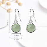 925 sterling silver jade drop earrings for women, featuring polished green jade stones and elegant dangling design