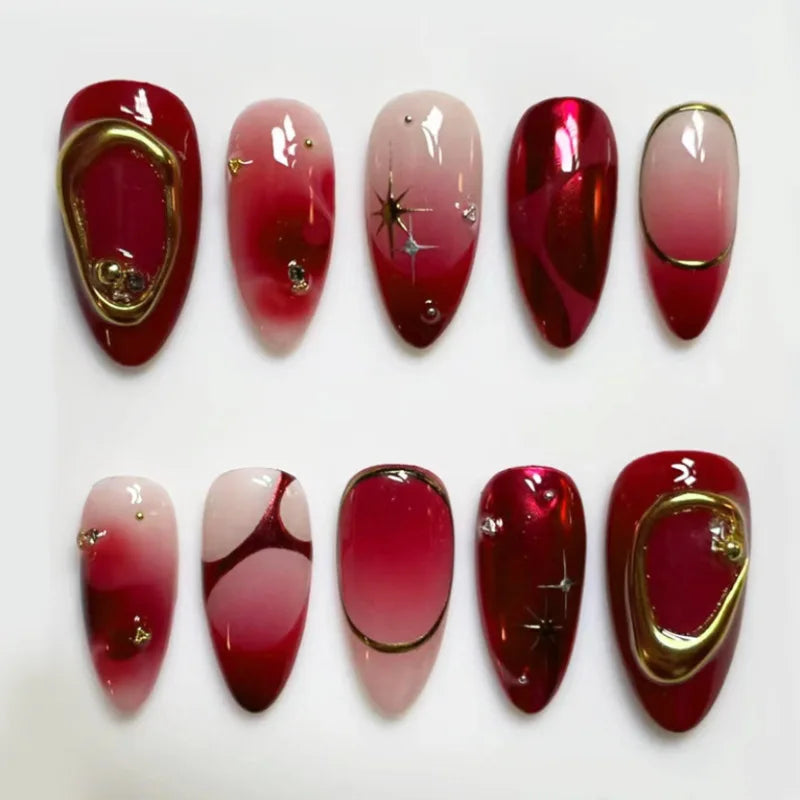 24-piece Y2K star press-on false nails with gradient blue French tips and gold moon designs in a sweet almond shape