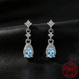 Sterling silver dangle drop earrings with sea blue CZ stones for women by HSF Marketplace