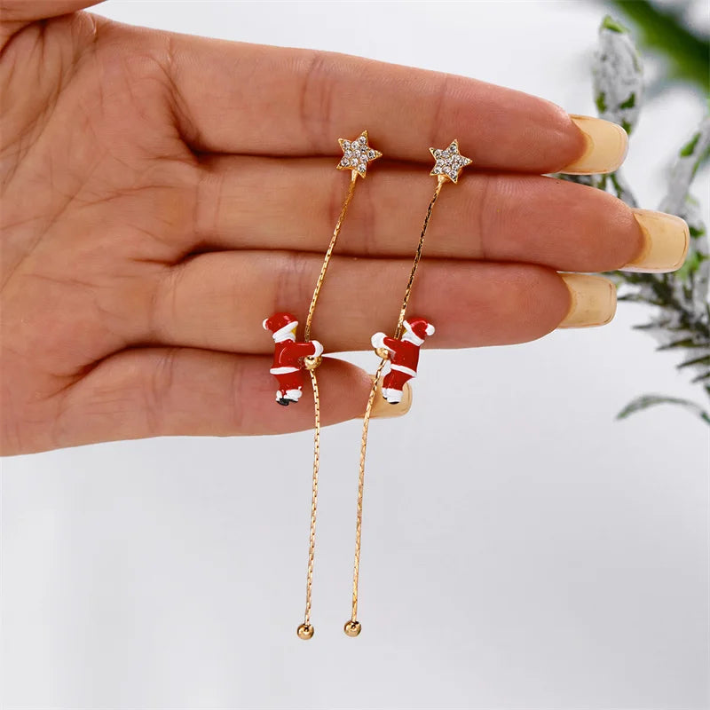 Moving Santa Claus tassel dangle earrings by HSF Marketplace for festive style