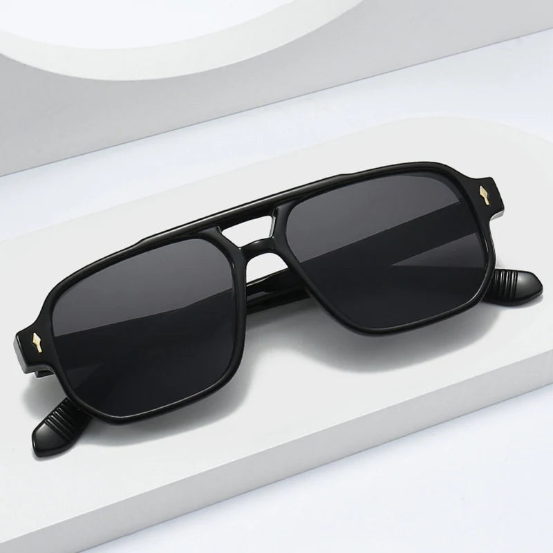 Vintage men's square sunglasses with clear ocean lenses, rivet accents, UV400 protection, featuring double bridge design.