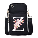 Small floral Sakura alphabet graphic crossbody bag for women, featuring letters, mobile phone pocket, and stylish messenger design.