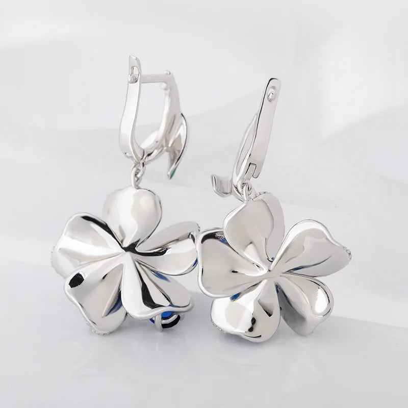 Blue enamel flower dangle earrings in 925 sterling silver by HSF Marketplace