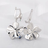 Blue enamel flower dangle earrings in 925 sterling silver by HSF Marketplace