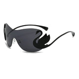 Y2k trendy women's oversized rimless sunglasses by HSF Marketplace with gradient lenses and swan inlay design.