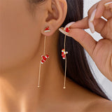 Moving Santa Claus tassel dangle earrings in a festive holiday jewelry design by HSF Marketplace