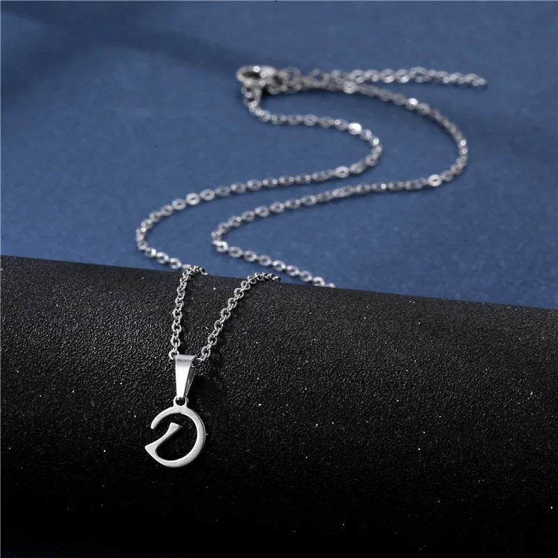 Shiny stainless steel initial letter pendant necklace for women, featuring a simple glossy design on a delicate clavicle chain.