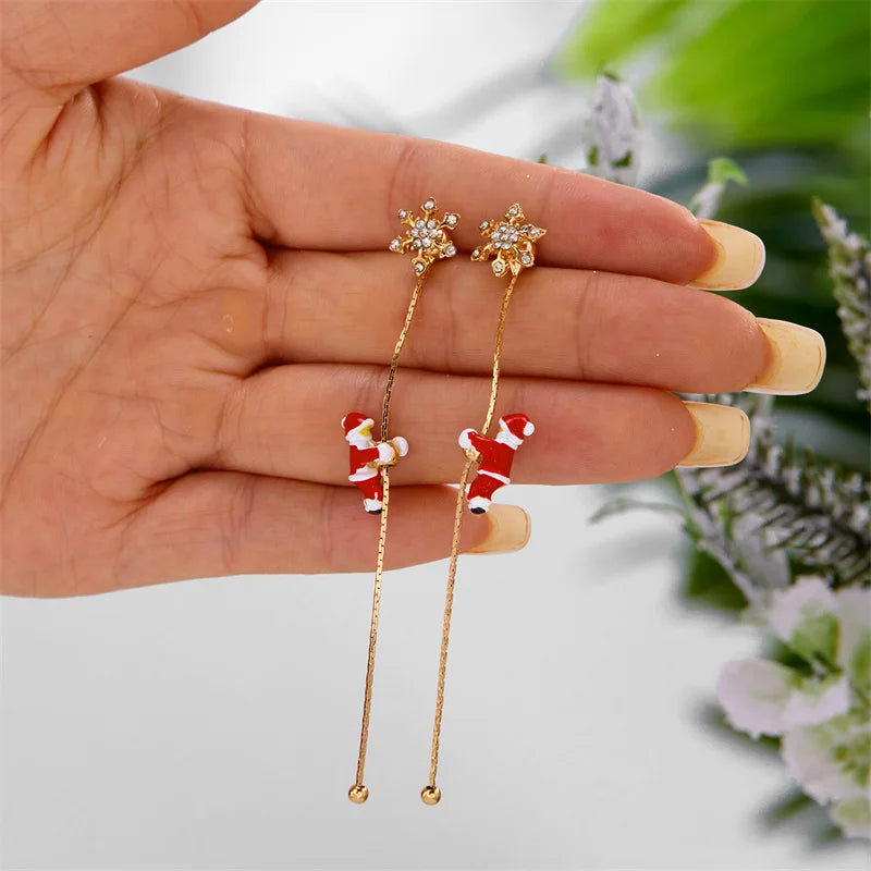 Moving Santa Claus tassel dangle earrings for festive style by HSF Marketplace