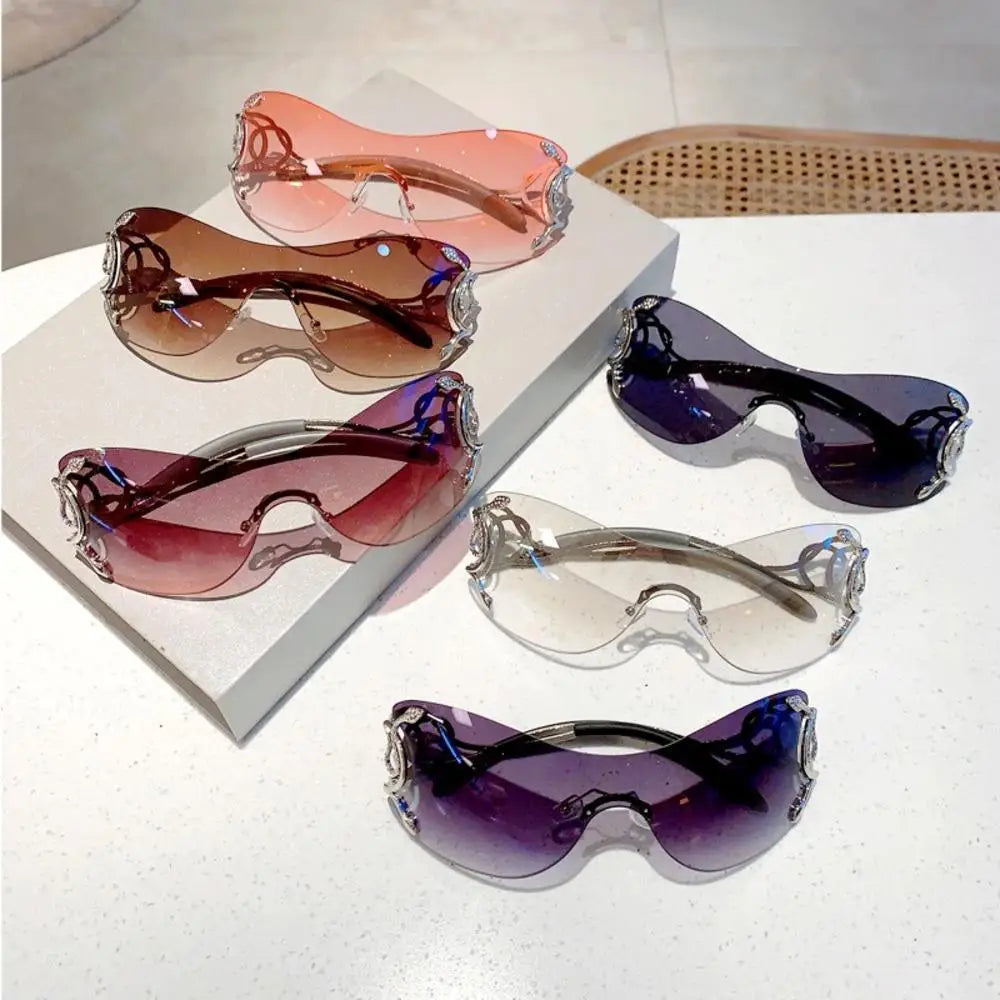 Y2k rimless sunglasses for women with snake ray metal frame, gradient lenses, wrap-around punk style eyewear, luxury fashion accessory