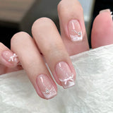24-piece cute girly short square false nails with white French tips, glitter stars, rhinestones, cat-eye, and bow art