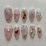 24-piece pink almond press-on false nails with bowknots, love hearts, and pearl design by HSF Marketplace