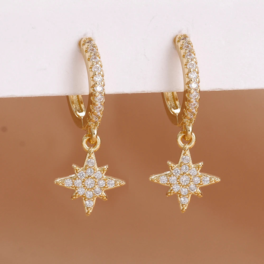 Stainless steel star dangle earrings with sparkling zircons by HSF Marketplace