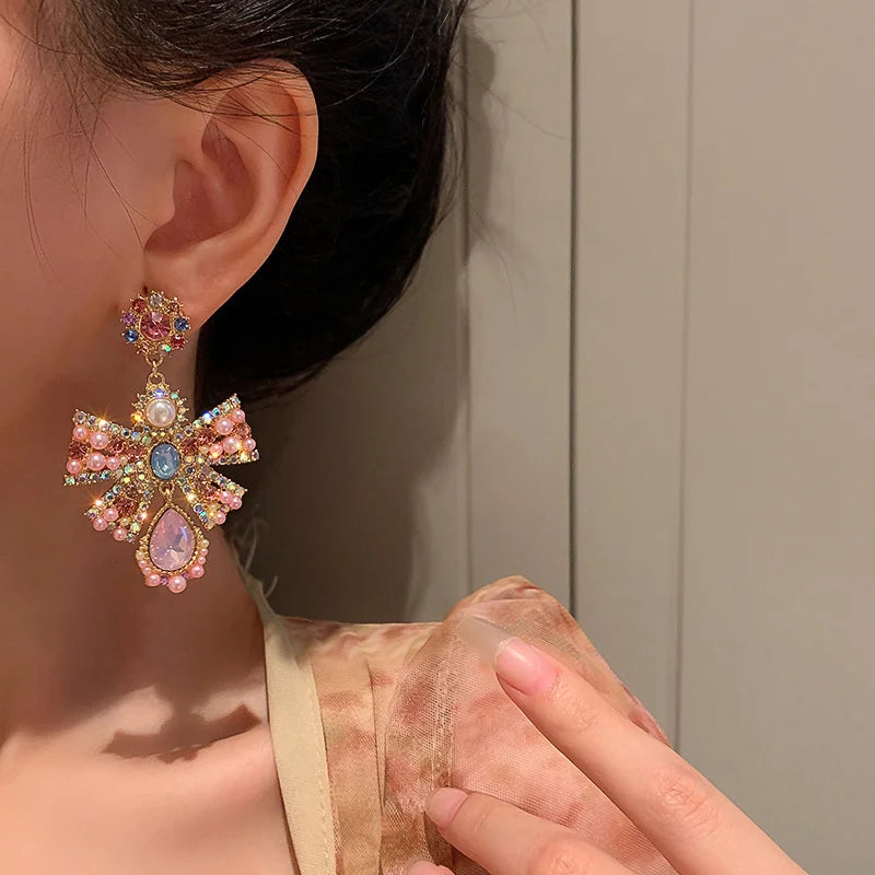 Pink crystal bowknot drop earrings for women, trendy statement jewelry by HSF Marketplace