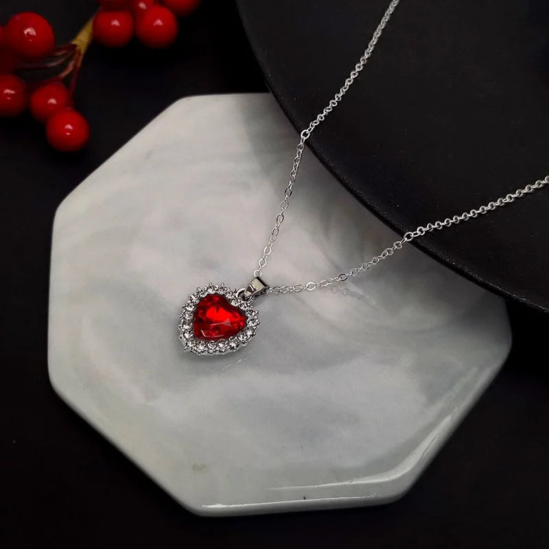 Luxury OL rhinestone crystal heart pendant necklace for women, elegant party jewelry gift featuring sparkling stones and a delicate chain.