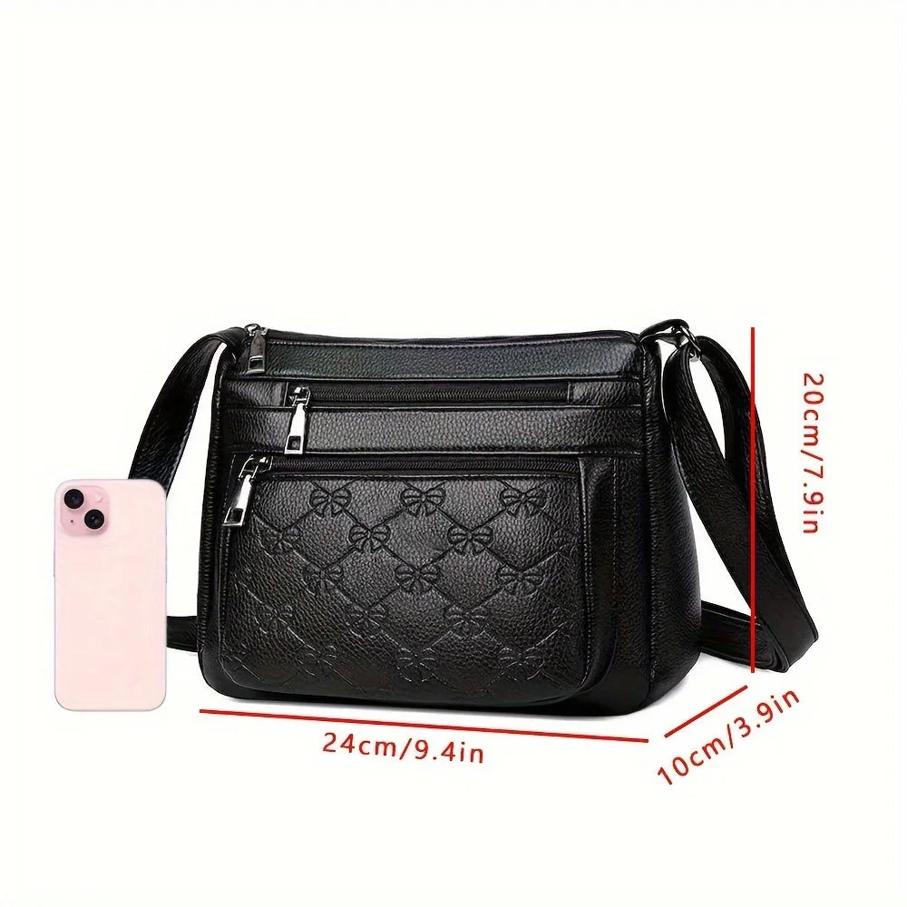 Black women’s crossbody handbag by HSF Marketplace with embossed leather, multi-pocket design, perfect for outings and parties.