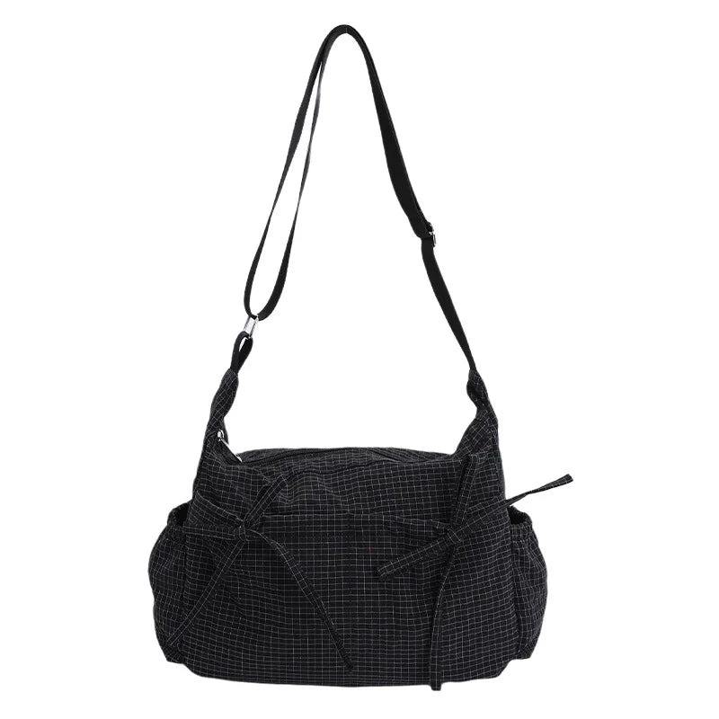 Women checkered nylon sling bag with drawstring, large capacity crossbody handbag, trendy satchel for shopping and casual outings.