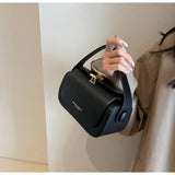 Black leather shoulder bag with textured flap, versatile retro design, large capacity, square shape, ideal for women’s handbags and purses.
