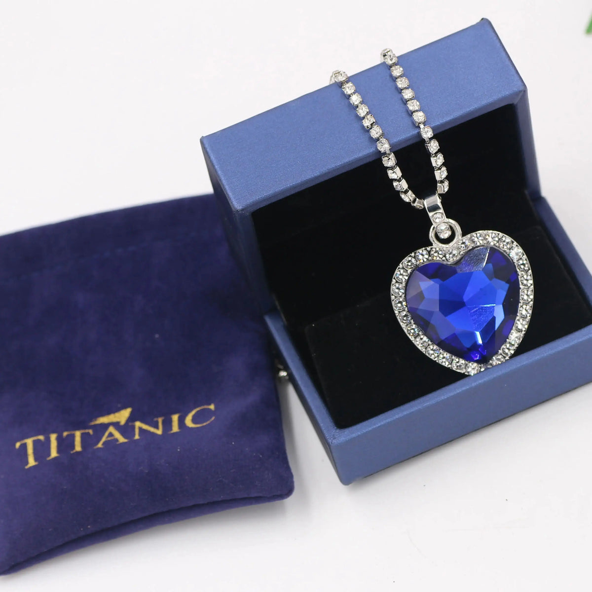 Titanic Heart of Ocean blue heart pendant necklace by HSF Marketplace with velvet gift bag, featuring a love-themed jewelry design.