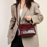 Elegant black leather small handbag for women with a shoulder strap, designer-style crossbody bag from HSF Marketplace.