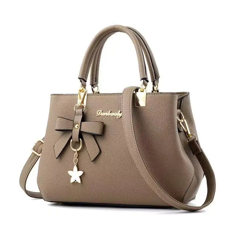Korean trendy autumn and winter bow shoulder bag by HSF Marketplace, large portable messenger purse for women.