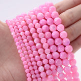 Natural freshwater shell pearls beads for jewelry making, shown as loose bead strands with a smooth pearlescent finish