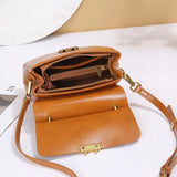 Vintage cow leather women’s handbag in brown, designed for stylish commuters