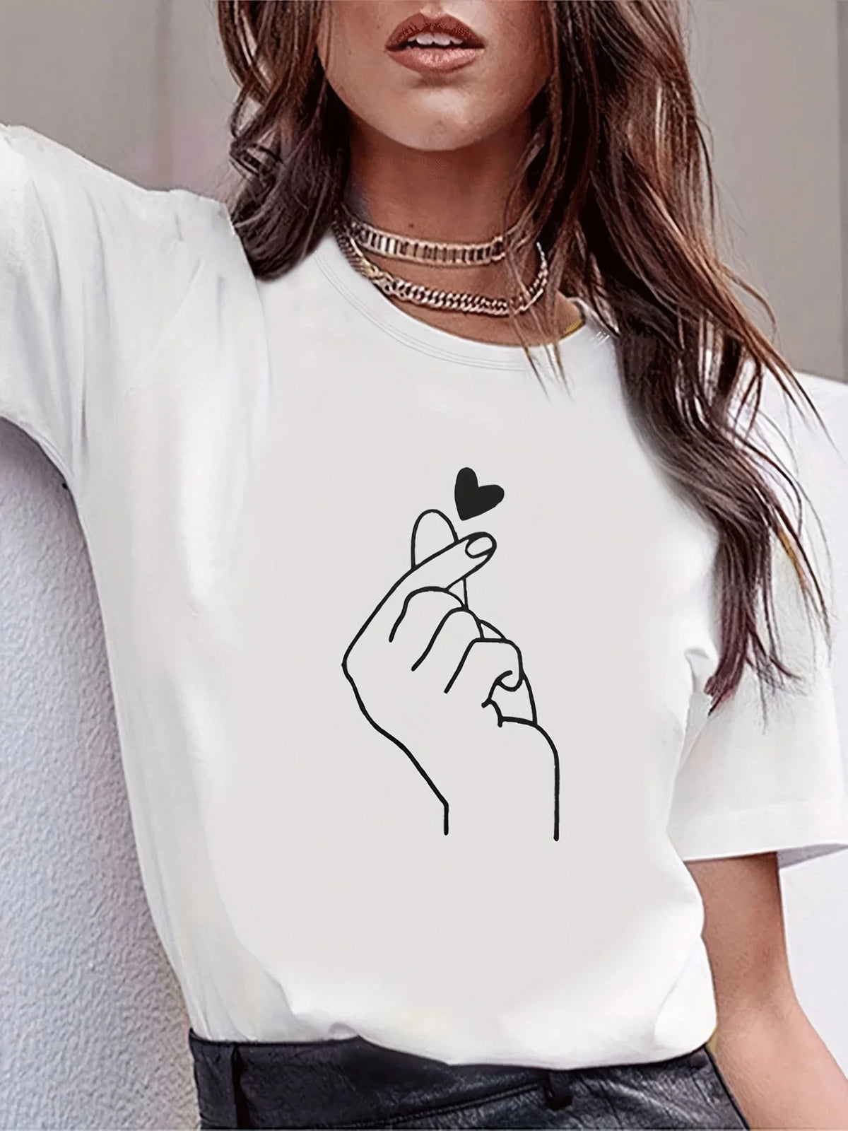Women's cute heart print crew neck T-shirt by HSF Marketplace on a white background