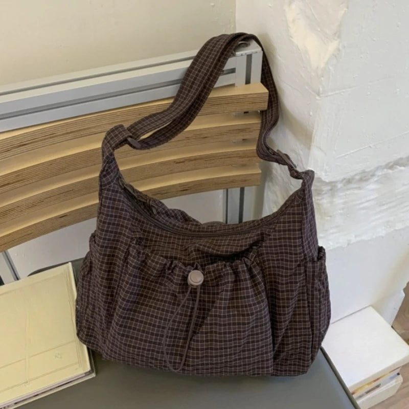 Women checkered nylon sling bag with drawstring, large capacity trendy satchel, crossbody design, suitable for shopping and dates.