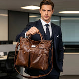 Vintage leather tote bag by HSF Marketplace featuring brown, navy, and coffee tones, with sturdy handles and classic design.