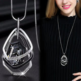 Elegant geometric chain necklace for women featuring a long pendant, stylish jewelry accessory for modern fashion.