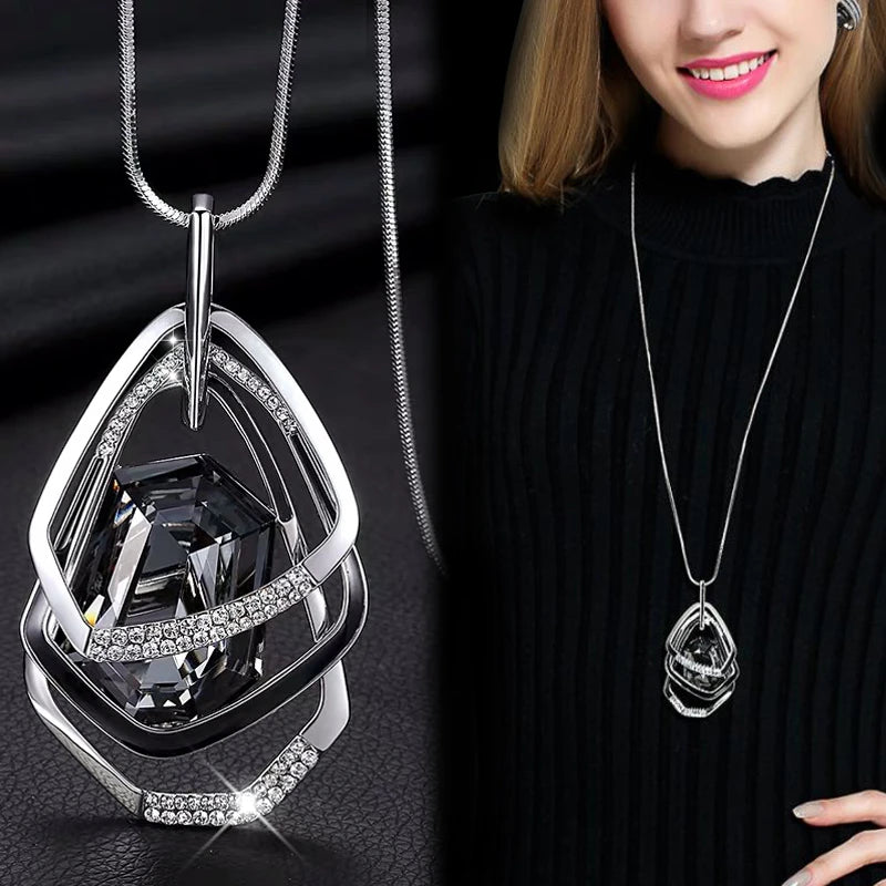 Elegant geometric chain necklace for women featuring a long pendant, stylish jewelry accessory for modern fashion.