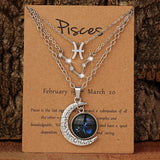 Three-piece zodiac moon glow pendant necklace set with birthstone cards, featuring retro jewelry design for birthdays and special occasions.