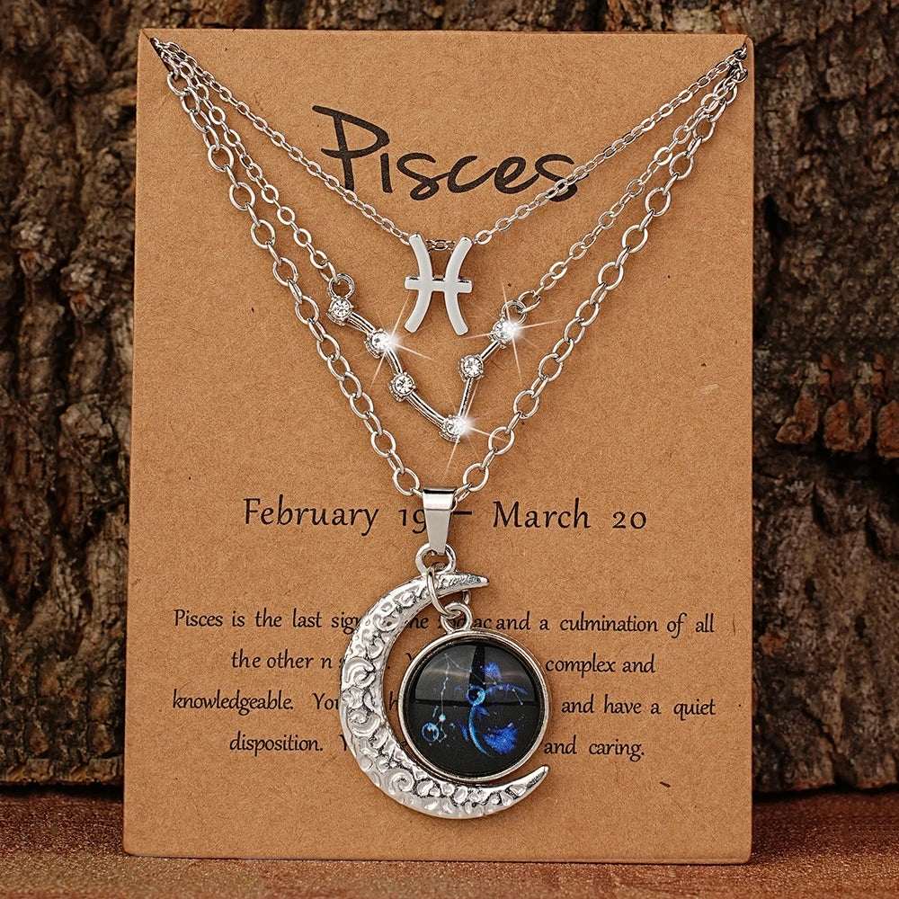 Three-piece zodiac moon glow pendant necklace set with birthstone cards, featuring retro jewelry design for birthdays and special occasions.
