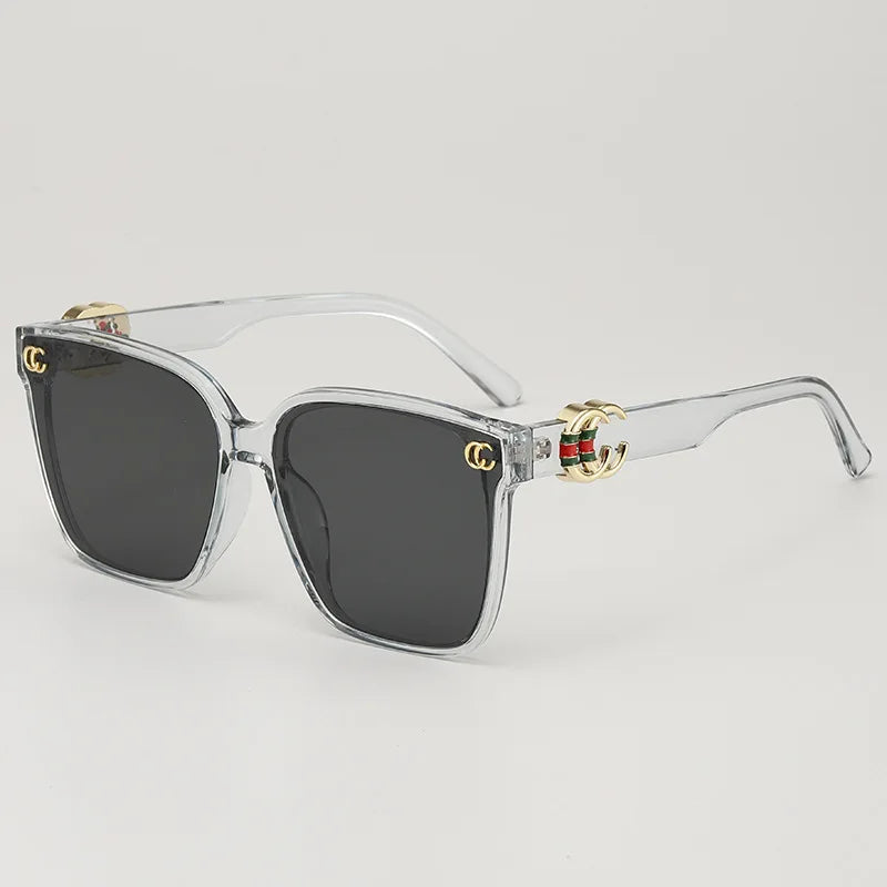 Women's luxury fashion sunglasses with floral details, letter accents, and UV400 lenses