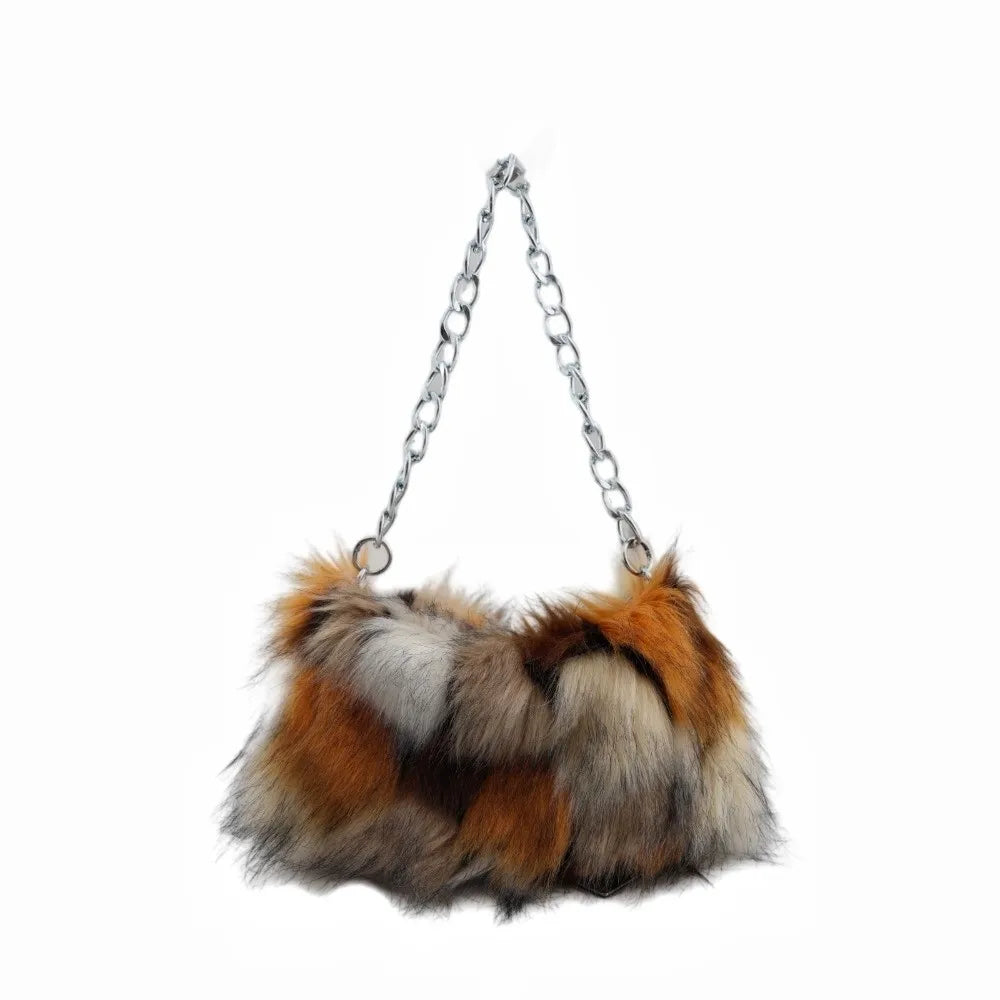 Leopard print luxury handbag by HSF Marketplace featuring a soft chain shoulder strap and large capacity underarm design.