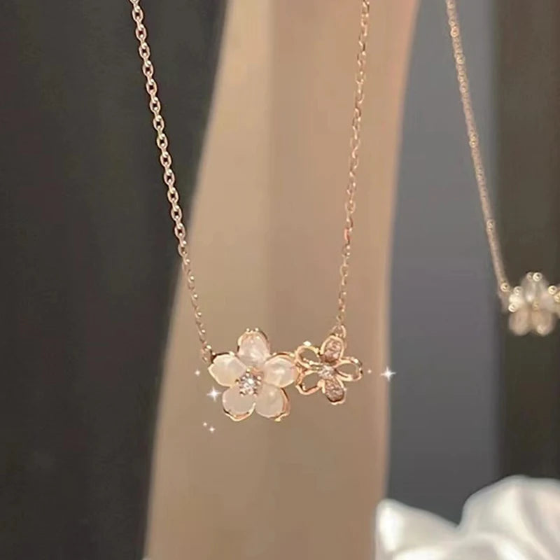 Elegant zircon cherry blossom necklace for women, featuring delicate floral design and fashion jewelry for special occasions.