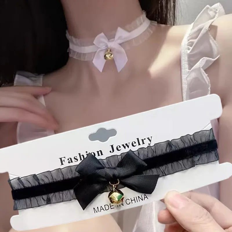 Women's Gothic lace choker necklace with bow and small bell pendant, stylish and cute fashion jewelry by HSF Marketplace.