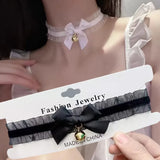 Women's Gothic lace choker necklace with bow and small bell pendant, stylish and cute fashion jewelry by HSF Marketplace.