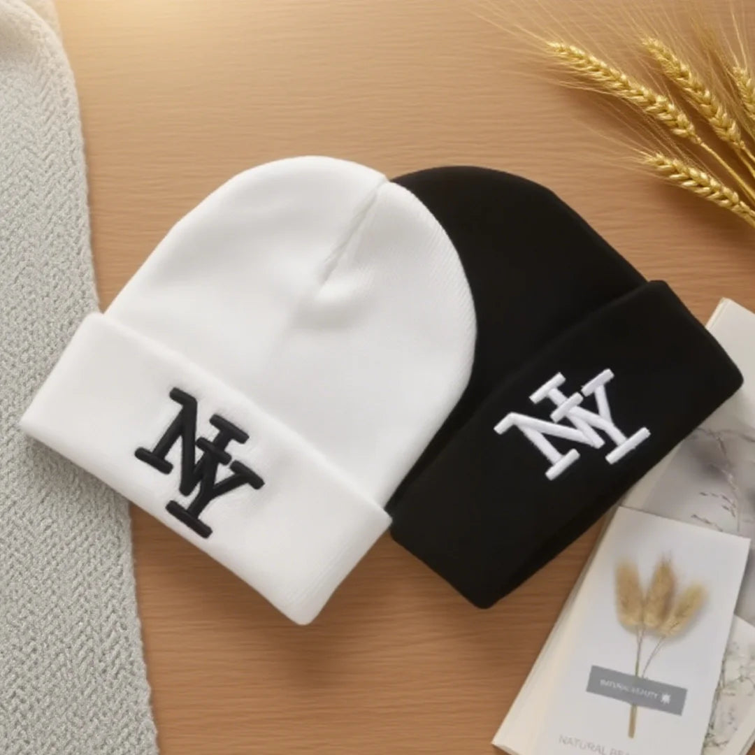 Unisex winter beanie hat with solid color 3D embroidery, knitted design for warm outdoor wear