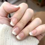 24-piece cute girly short square press-on false nails with white French tips, glitter stars, rhinestones, bows, and cat-eye accents