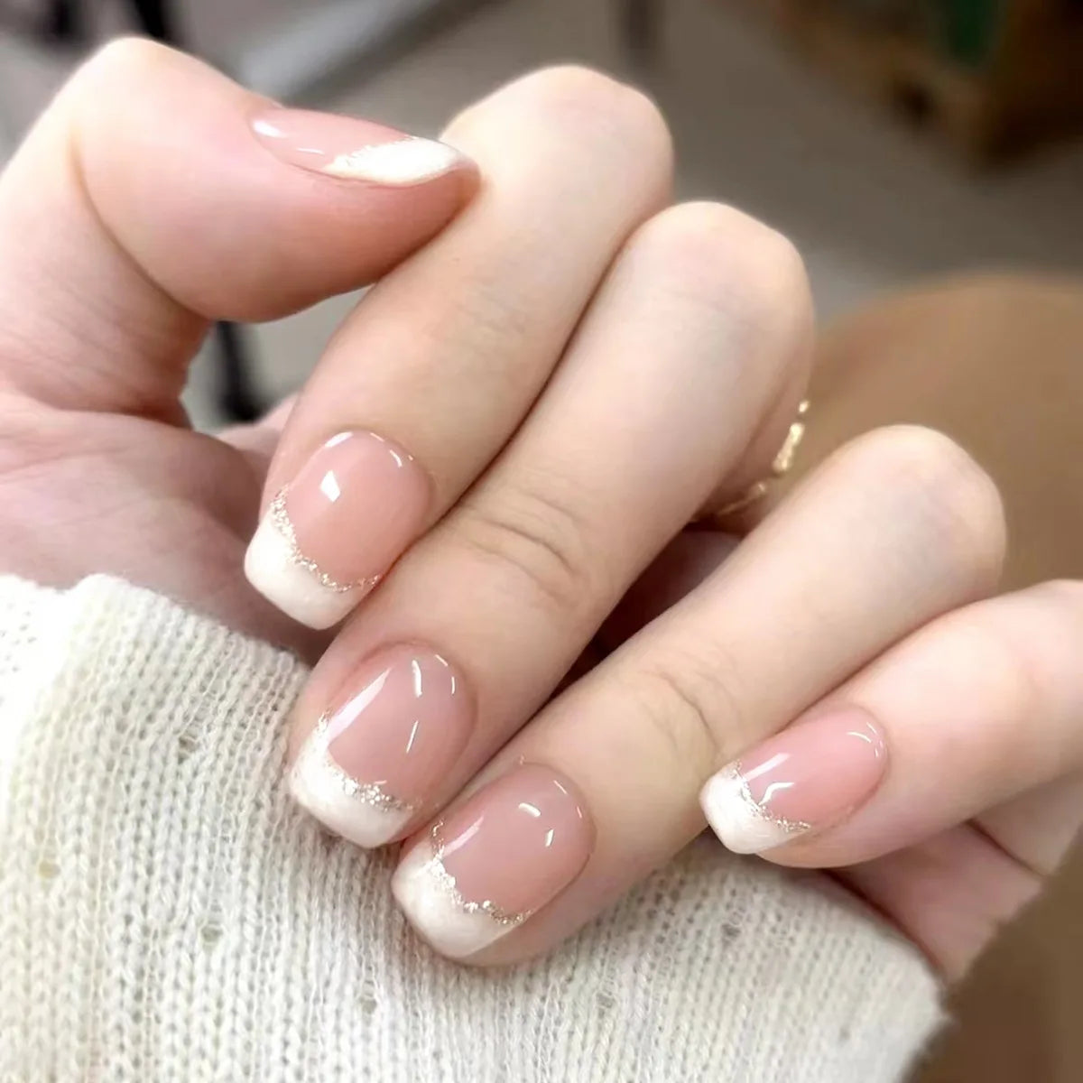 24-piece cute girly short square press-on false nails with white French tips, glitter stars, rhinestones, bows, and cat-eye accents