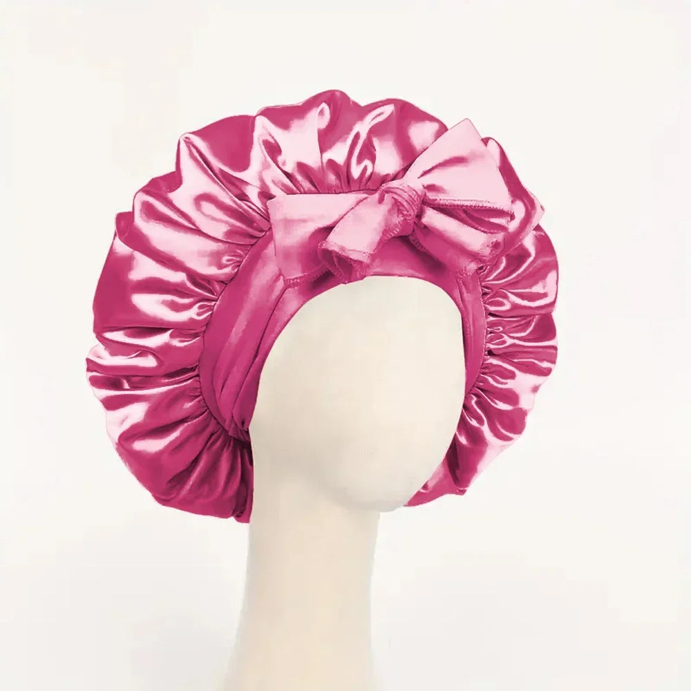Silk satin bonnet with adjustable tie band for women and men, ideal for protecting hair during sleep, by HSF Marketplace.